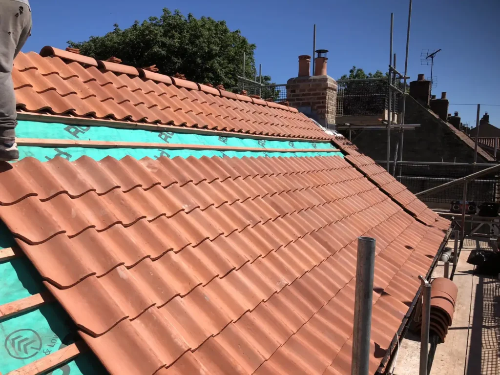 Completed tile work showcases the expert re-roofing finish by Roofing Whangarei.