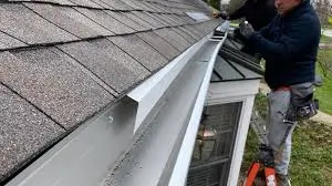 Roofing Whangarei team installing new guttering during professional Gutter and Flashing Repairs.